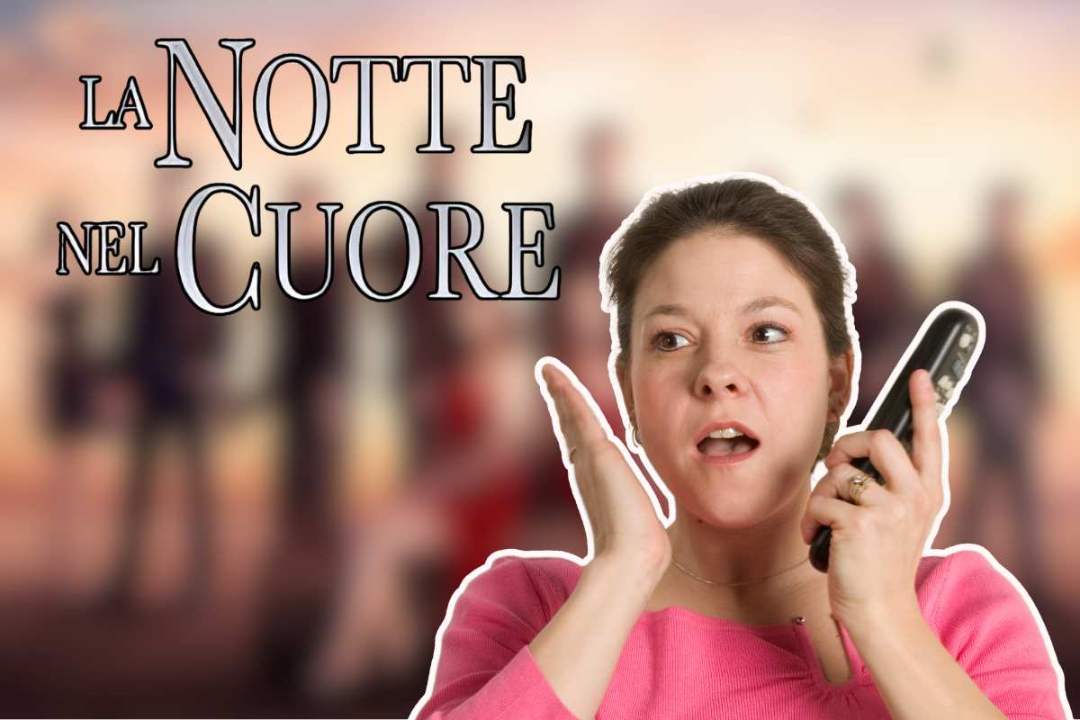 donna con telecomando e scritta
